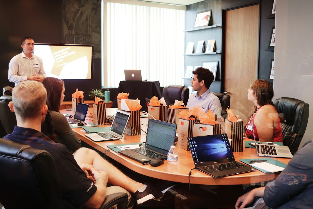 A consultant walking a business team through a funding plan